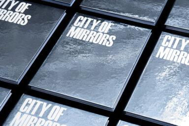 City of Mirrors photography book designed by FAY Design.