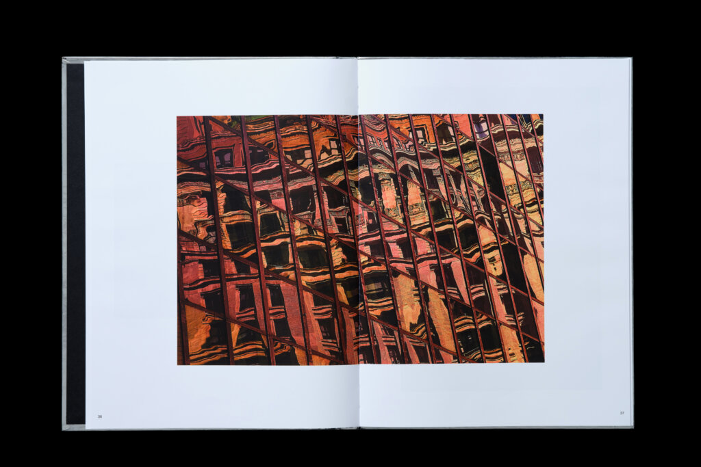 City of Mirrors photo book spread designed by FAY.