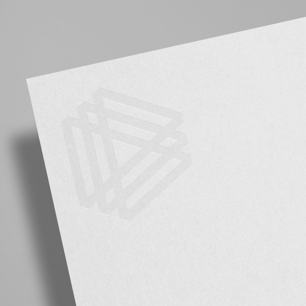 Paradigm's debossed symbol, designed by FAY.